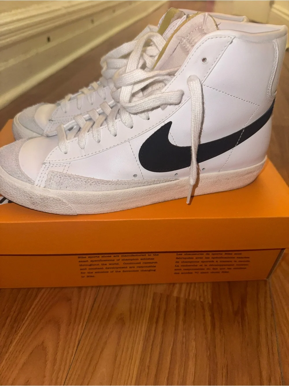 Nike Blazer Mid '77 white sneakers with black Nike swoosh